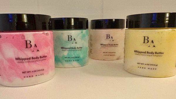 Five jars of 'BA' whipped body butter on a white background